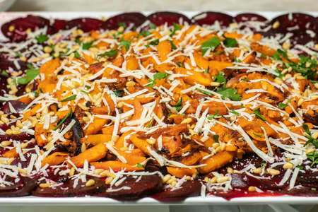 Roasted pumpkin with cheese and herbsの写真素材