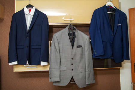 Stylish three-piece suit. Mens jacket on a mannequin. Mens Clothingの写真素材