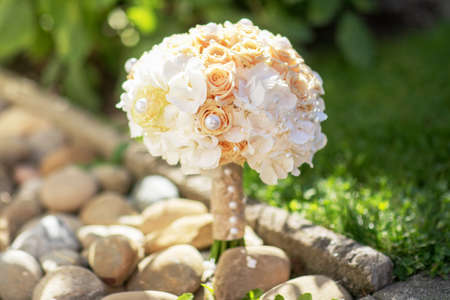 Closeup photo of wedding white rose bouqetの写真素材