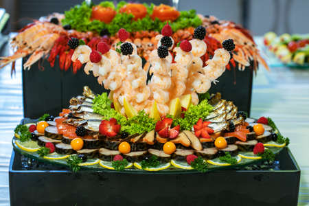 variety of seafood on a plate ready to eatの写真素材