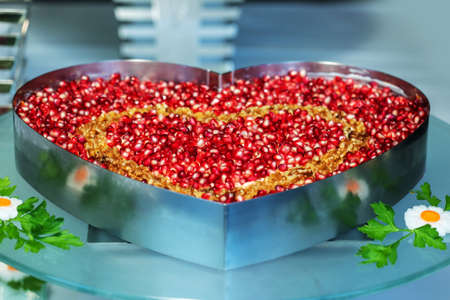 Healthy salad of fresh vegetables and pomegranate seedsの写真素材