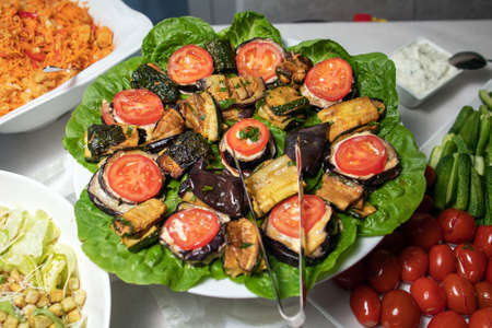 Fried eggplants in a frying pan.