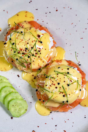 Breakfast is Egg benedict on plateの写真素材