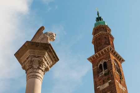 The column with the Lion of Saint Mark and the Clock tower in Lordsの写真素材