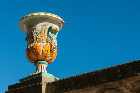 Close-up view of a typical colored ceramic vase from Caltagirone used as an ornament in the main public gardens of the townの写真素材