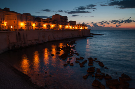 Eastern side of old Syracuse by night before the dawnの写真素材