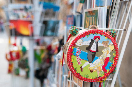 Close up view of a typical colored and painted Sicilian tambourine, out of a souvenir shop in Syracuseの写真素材