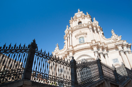 Tha facade of St. George church in Ragusa Ibla, seen from one side of its external staircaseの写真素材