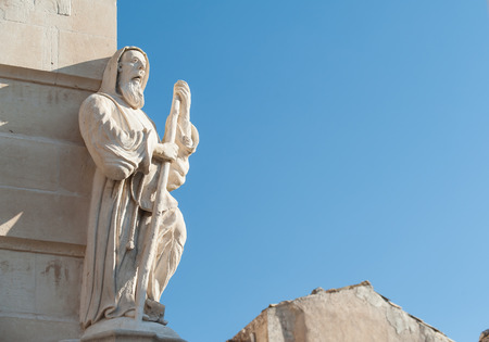 The baroque statue of St. Francis of Paola sculpted at the corner of Cosentini palace in Ragusa Iblaのeditorial素材