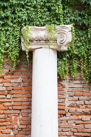 White stone column in the external courtyard of the olimpic theater in Vicenzaの写真素材