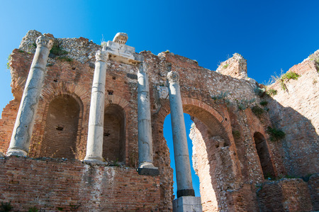 Bottom view of the columns and the arcade in the scene of the roman theater in Taormina, Sicilyの写真素材