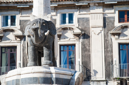 The famous lava stone statue of an elephant and its obelisk in Catania, Sicily, the symbol of the townの写真素材
