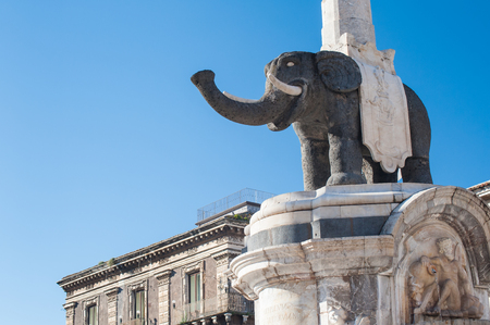 The famous lava stone statue of an elephant and its obelisk in Catania, Sicily, the symbol of the townの写真素材