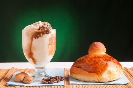 Almond and coffee sicilian granita with a warm briocheの写真素材