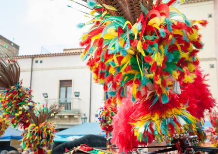 Ornamental and colorful feather on a sicilian carts During a folk festivalの写真素材