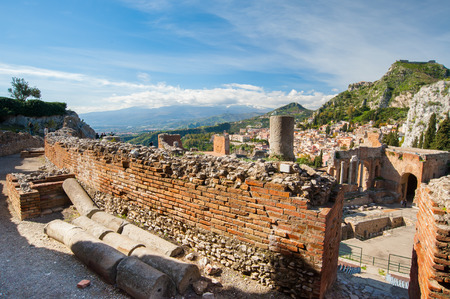 Section of the upper external arcade of the greek theater and a view of its stage, Taormina, East Sicilyの写真素材