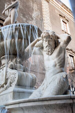 Closeup view of the Amenano fountain in Catania, Sicily, by the main Dome Squareの写真素材