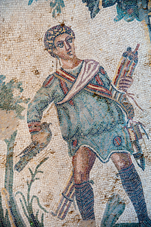 Closeup view of a hunter scene in the floor of the old roman Villa del Casale of the 4th century A.C. Unesco world heritage, Piazza Armerina, Sicilyの写真素材