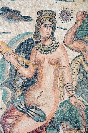Closeup view of figures in the floor of the old roman Villa del Casale of the 4th century A.C. Unesco world heritage, Piazza Armerina, Sicilyの写真素材