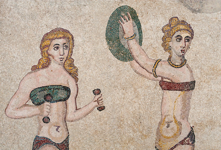 Mosaic of two dancers: the floor of the old roman Villa del Casale of the 4th century A.C. Unesco world heritage, Piazza Armerina, Sicilyの写真素材
