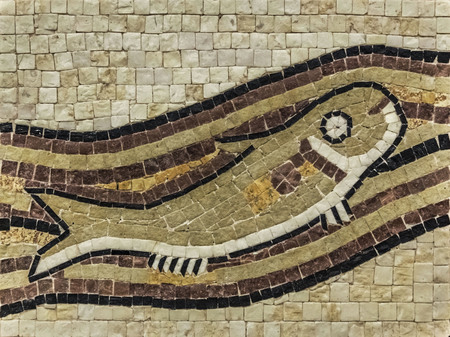 Illustration of fish swimming in the waves. National designs Jordan mosaic. Jordanian souvenir shop.の写真素材