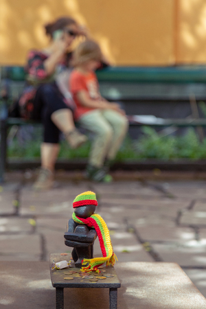 Iron Boy or Boy looking at the Moon Statue - the smallest public sculpture in Sweden, Stockholm. Gamla Stan, Old Town,.の写真素材