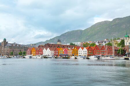 Bergen, Norway - Jule, 2016: View of a historical wooden district Bryggen in the norwegian city Bergen. Famous Bryggen street in Bergen Norway - architecture backgroundのeditorial素材