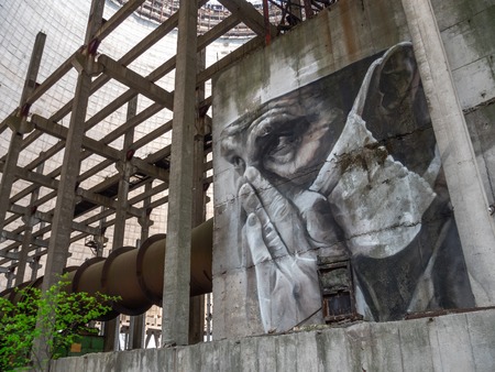 Chernobyl, Ukraine - April, 2019: Drawing graffiti on one of the concrete walls inside the Chernobyl Nuclear Power Station cooling tower, Chernobyl Exclusion Zone, Ukraineのeditorial素材