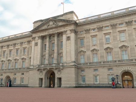 London, UK - April, 2019: The Queen's Guard on duty at Buckingham Palace, the official residence of the Queen of England. Solider of Buckingham palace, London England.のeditorial素材