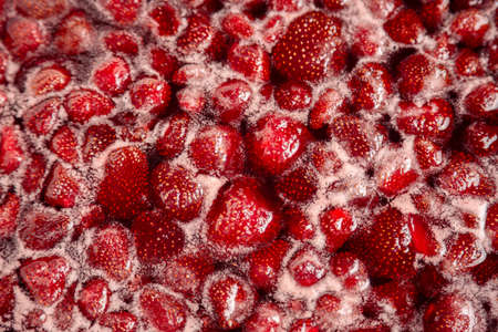 CLOSE UP: Strawberry jam. Make a strawberry jam. Boil strawberries in the pan. Process of cooking,...