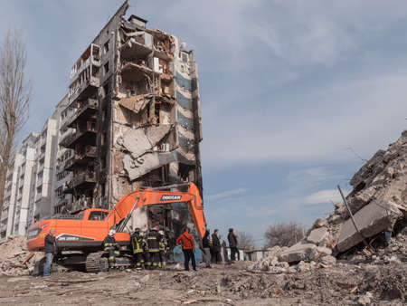 Borodyanka, Ukraine - April 2022: War in Ukrainian city, Russian air bomb hit a residential apartment building. War in Ukraine, ruined building after bombing. Russian bomb hit the civilian buildings.のeditorial素材