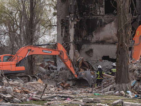Borodyanka, Ukraine - April 2022: War in Ukrainian city, Russian air bomb hit a residential apartment building. War in Ukraine, ruined building after bombing. Russian bomb hit the civilian buildings.のeditorial素材