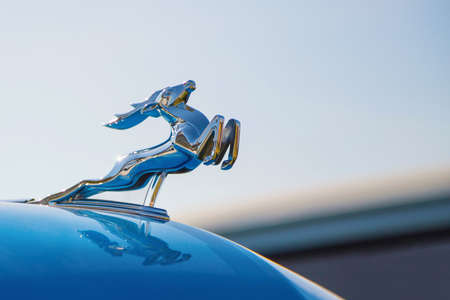 Kiev, Ukraine- April 26, 2015: The Retro OldCarFest in Kiev. Logo car ''Volga'' GAZ-21 close-up.のeditorial素材