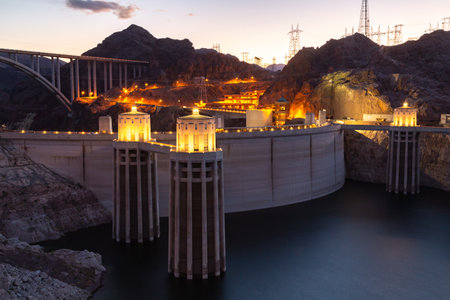 Hoover dam close-up shot. Hoover dam and Lake Mead in Las Vegas area. Large Comstock Intake Towers At Hoover Dam. Hoover Dam in the evening with illuminations without people.の写真素材