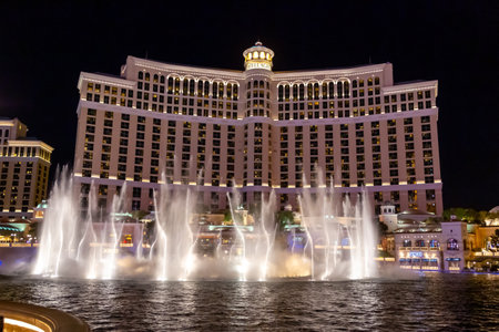 Las Vegas, Nevada - April 2017: Fountains of Bellagio. Fountains at Bellagio Hotel and Casino in Las Vegas. Bellagio fountain water show at night. Bellagio hotel and the dancing fountains.のeditorial素材