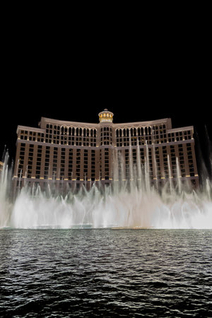 Las Vegas, Nevada - April 2017: Fountains of Bellagio. Fountains at Bellagio Hotel and Casino in Las Vegas. Bellagio fountain water show at night. Bellagio hotel and the dancing fountains.のeditorial素材