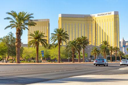 Las Vegas, Nevada - April 2017: Mandalay Bay. Entering Las Vegas, Mandalay Bay is the first hotel on the main boulevard of the city. Golden facade of Mandalay Bay sparkles in the rays of the sun.のeditorial素材