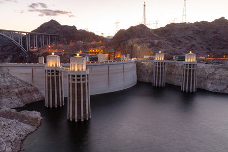 Hoover dam close-up shot. Hoover dam and Lake Mead in Las Vegas area. Large Comstock Intake Towers At Hoover Dam. Hoover Dam in the evening with illuminations without people.の写真素材