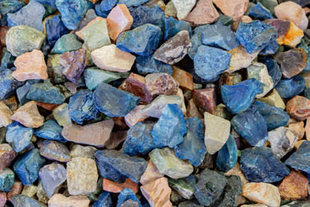 Colorful stones background. Natural mineral stones close up. Background colorful raw gemstones perfect for jewelry making. Vibrant and textured natural collection. Raw Rough Natural Colorful Stonesの写真素材