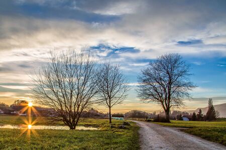 Sunset refelction in pound in Switzerlandの写真素材