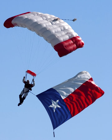 Texas flag and skydiverの写真素材