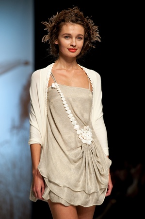 KIEV, UKRAINE - OCTOBER 17: Fashion model wears clothes created by "Olena Dats" at the 24th Ukrainian Fashion Week on Oct. 17, 2009 in Kiev, Ukraine.のeditorial素材