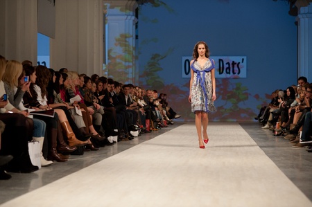 KIEV, UKRAINE - OCTOBER 14: Fashion model wears clothes created by "Olena Dats" at the Ukrainian Fashion Week on Oct. 14, 2011 in Kiev, Ukraine.のeditorial素材