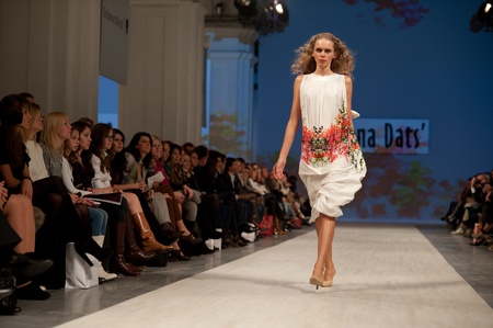 KIEV, UKRAINE - OCTOBER 14: Fashion model wears clothes created by "Olena Dats" at the Ukrainian Fashion Week on Oct. 14, 2011 in Kiev, Ukraine.のeditorial素材