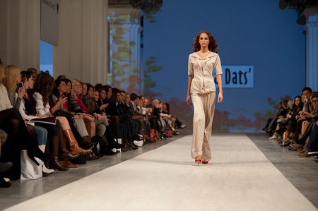 KIEV, UKRAINE - OCTOBER 14: Fashion model wears clothes created by "Olena Dats" at the Ukrainian Fashion Week on Oct. 14, 2011 in Kiev, Ukraine.のeditorial素材