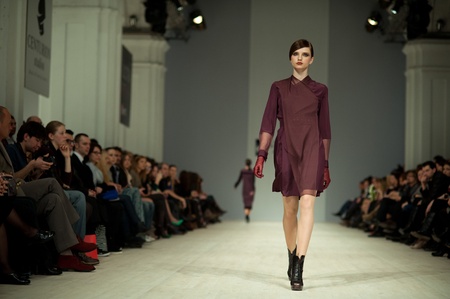 KIEV, UKRAINE - MARCH 14: Fashion model wears clothes created by 'Tetyana ZEMSKOVA & Olena VOROJBIT' at the Ukrainian Fashion Week on Mar. 14, 2012 in Kiev, Ukraine.のeditorial素材