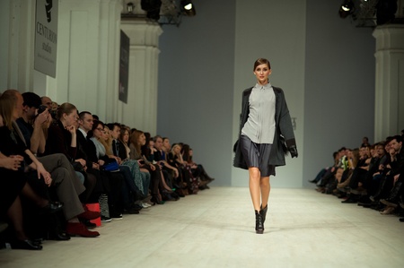 KIEV, UKRAINE - MARCH 14: Fashion model wears clothes created by 'Tetyana ZEMSKOVA & Olena VOROJBIT' at the Ukrainian Fashion Week on Mar. 14, 2012 in Kiev, Ukraine.のeditorial素材