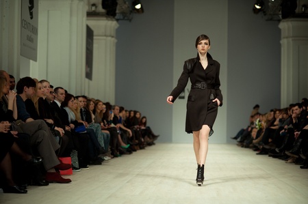KIEV, UKRAINE - MARCH 14: Fashion model wears clothes created by 'Tetyana ZEMSKOVA & Olena VOROJBIT' at the Ukrainian Fashion Week on Mar. 14, 2012 in Kiev, Ukraine.のeditorial素材