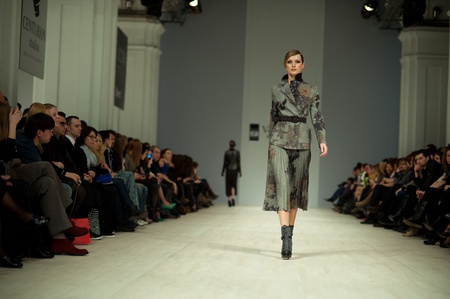 KIEV, UKRAINE - MARCH 14: Fashion model wears clothes created by 'Tetyana ZEMSKOVA & Olena VOROJBIT' at the Ukrainian Fashion Week on Mar. 14, 2012 in Kiev, Ukraine.のeditorial素材