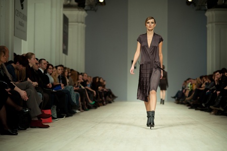 KIEV, UKRAINE - MARCH 14: Fashion model wears clothes created by 'Tetyana ZEMSKOVA & Olena VOROJBIT' at the Ukrainian Fashion Week on Mar. 14, 2012 in Kiev, Ukraine.のeditorial素材
